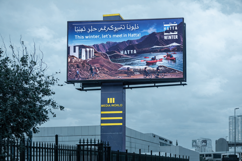 Tourism destination billboard promoting seasonal travel and demonstrating Outdoor Campaign ROI via immersive visual storytelling.
