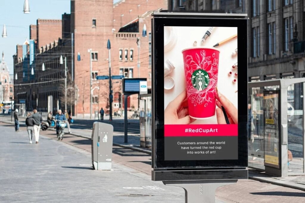 Street-level digital display panel featuring a branded campaign, demonstrating the impact of Dubai DOOH screens advertising in urban environments