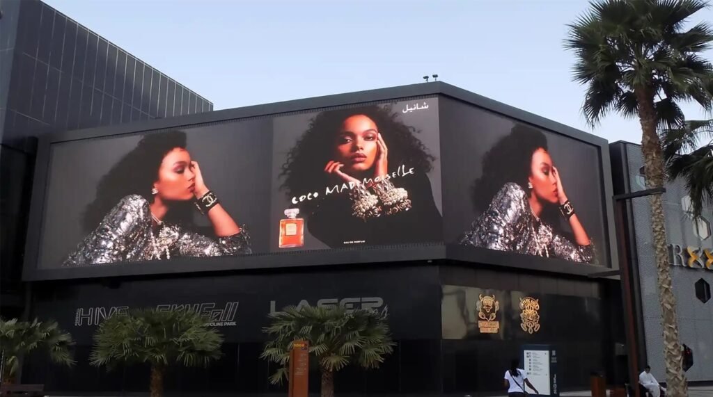 Al Ain DOOH Network with premium large-format LED screen advertising luxury brands at a high-footfall retail destination