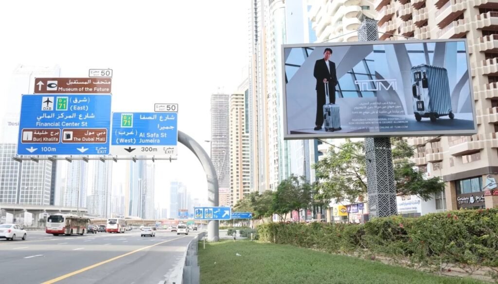 Al Ain DOOH Network roadside digital billboard capturing commuter attention along a high-traffic urban corridor