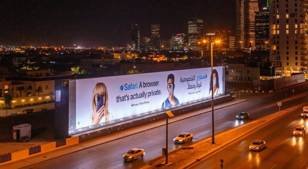 Night-time mega billboard advertising along a Dubai arterial road, showcasing premium outdoor visibility and real-world billboard campaign cost Dubai considerations
