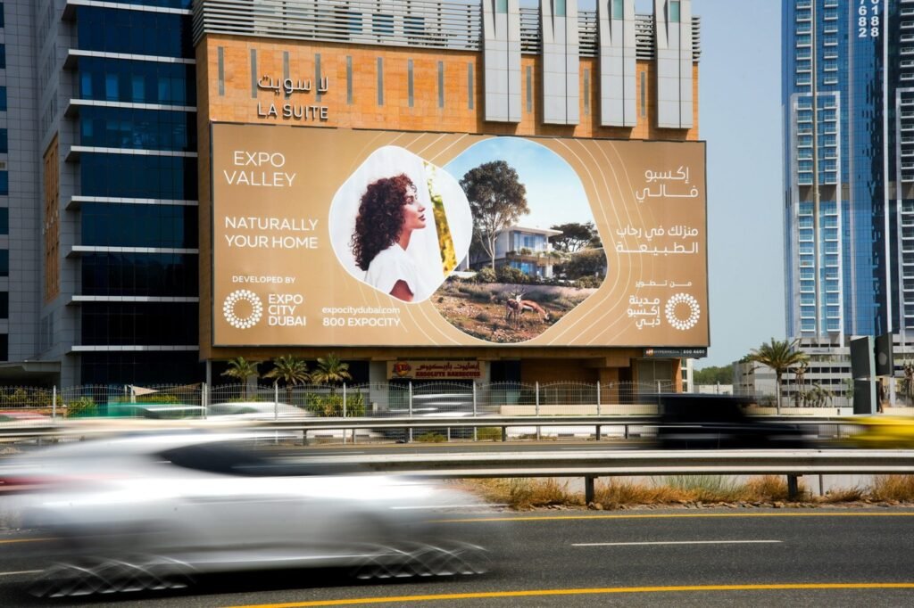 Outdoor campaign strategy highlighting urban billboard advertising for consistent brand visibility in UAE city centers