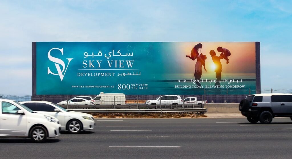 Outdoor campaign strategy showcasing a large-format billboard on a busy UAE highway for high-visibility brand exposure