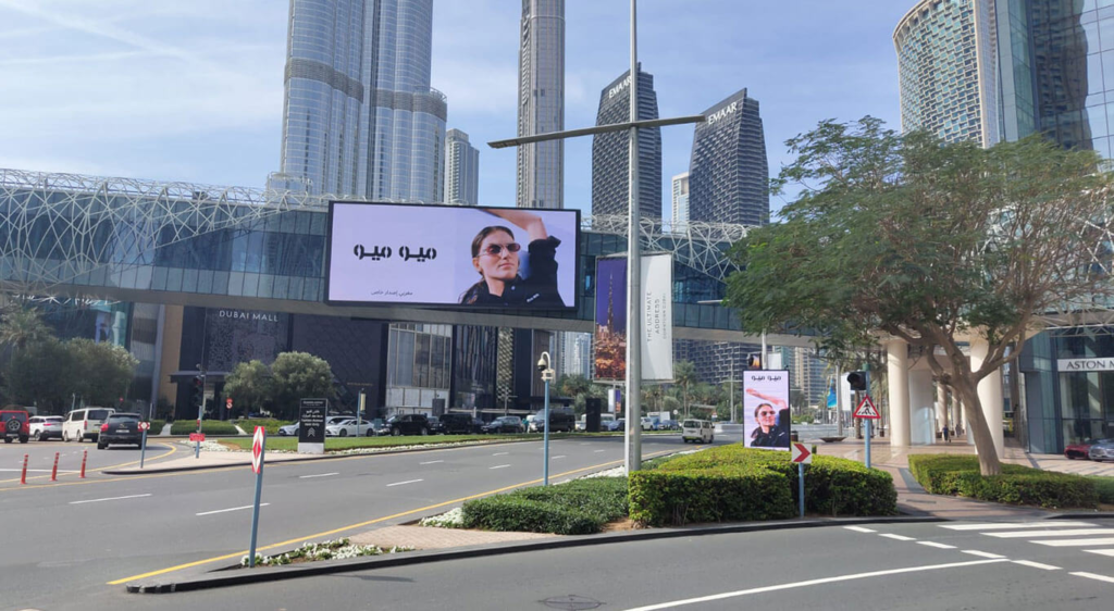 Outdoor advertising functions as a persistent communication channel. Instead of relying on short digital interactions, it creates physical brand presence across the city.